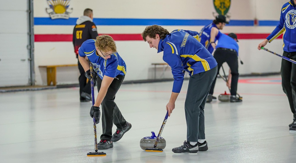 Voyageurs sweeping rock on day 1 of OUA Championships - Laurel Jarvis