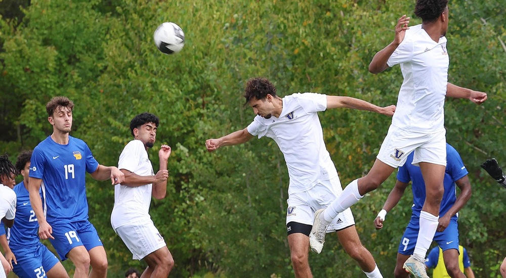 Theo Vieira heads the ball away - Gino Donato