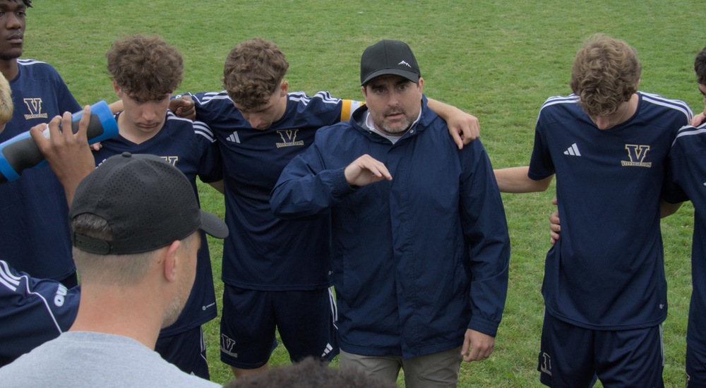 Coach Tony Tagliafierro giving his team instruction - Mark Wilson