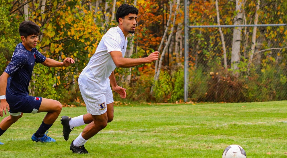 Olly Sankar looks to move the ball - Tyra Swan
