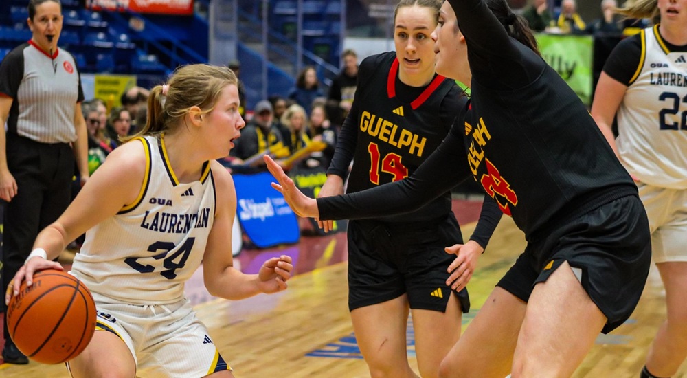 Cadence Pecore handles the ball vs Guelph - Tyra Swan