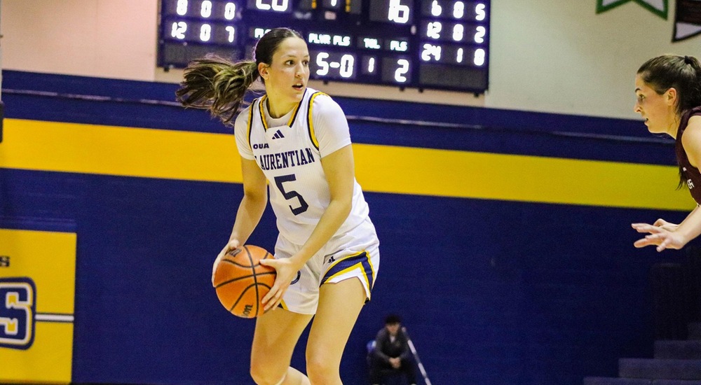 Molly Adams with the ball - Tyra Swan