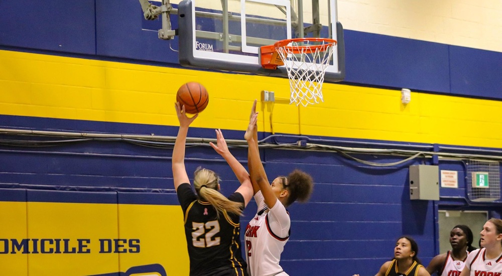 Emilie Lafond with a layup - Tyra Swan